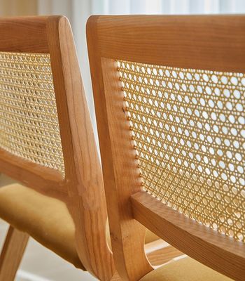 Moderne Polsterstühle aus Naturrattan aus Massivholz Esszimmerstuhl für Restaurant Hotel