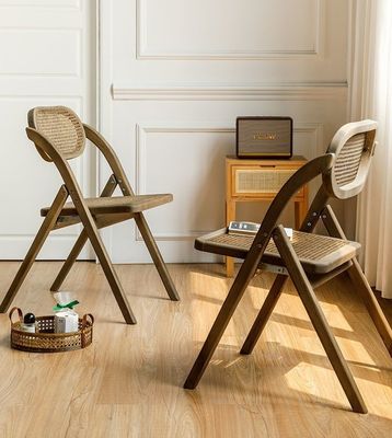 Allgemeine Wohnmöbel Festiger französischer moderner Stil Klappstuhl Rattan Rücken Massivholz Esszessel Klappstuhl