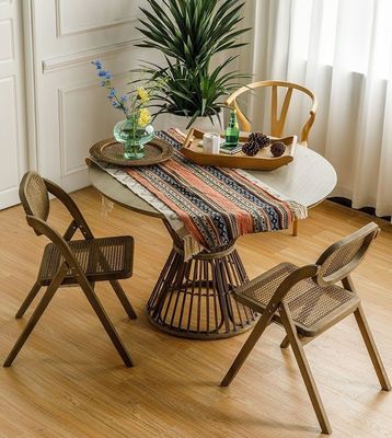Allgemeine Wohnmöbel Festiger französischer moderner Stil Klappstuhl Rattan Rücken Massivholz Esszessel Klappstuhl