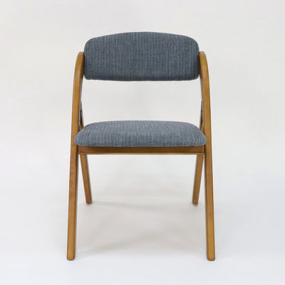 Maßgeschneiderter Holz-Esstuhl im Vintage-Stil mit klappbarem Design und Stoffbedeckung