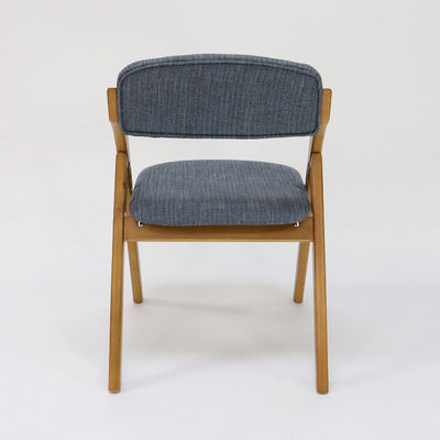 Maßgeschneiderter Holz-Esstuhl im Vintage-Stil mit klappbarem Design und Stoffbedeckung